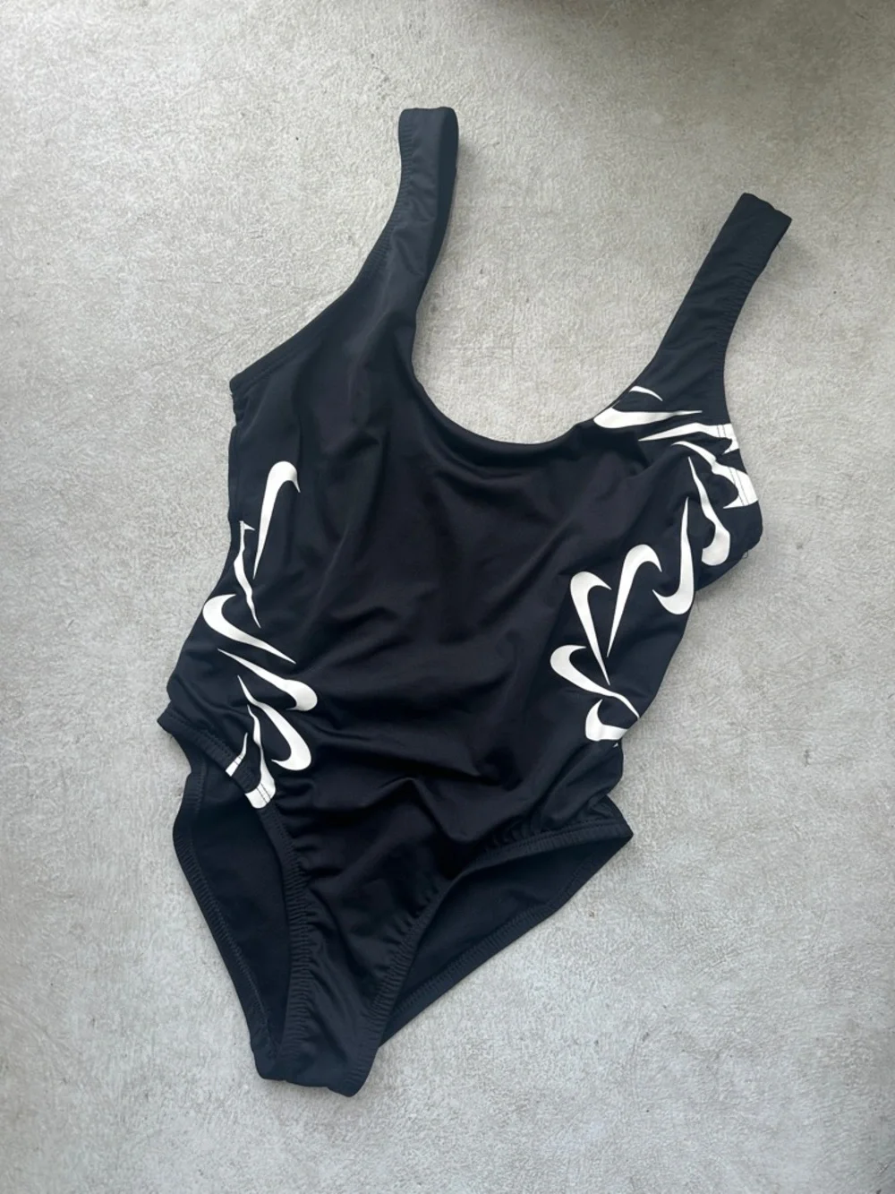 Nike Black One-Piece Swimsuit with White Swoosh Wave Accents - Picture 1 of 3
